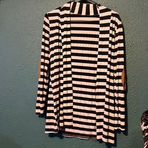 Cardigan size med bought from a local boutique.
